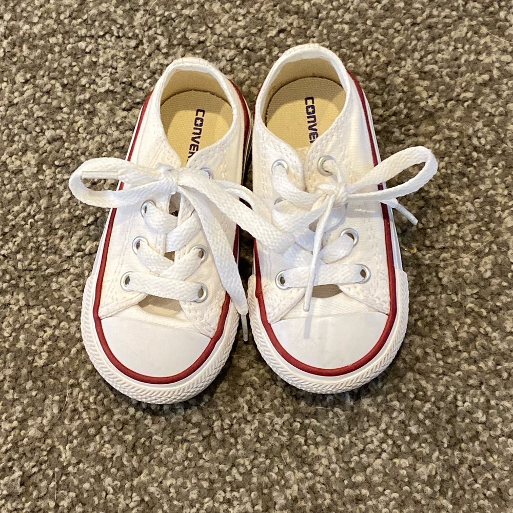 White Converse Chuck Taylors.
